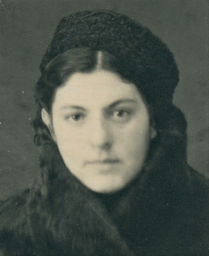 woman wearing hat and coat
