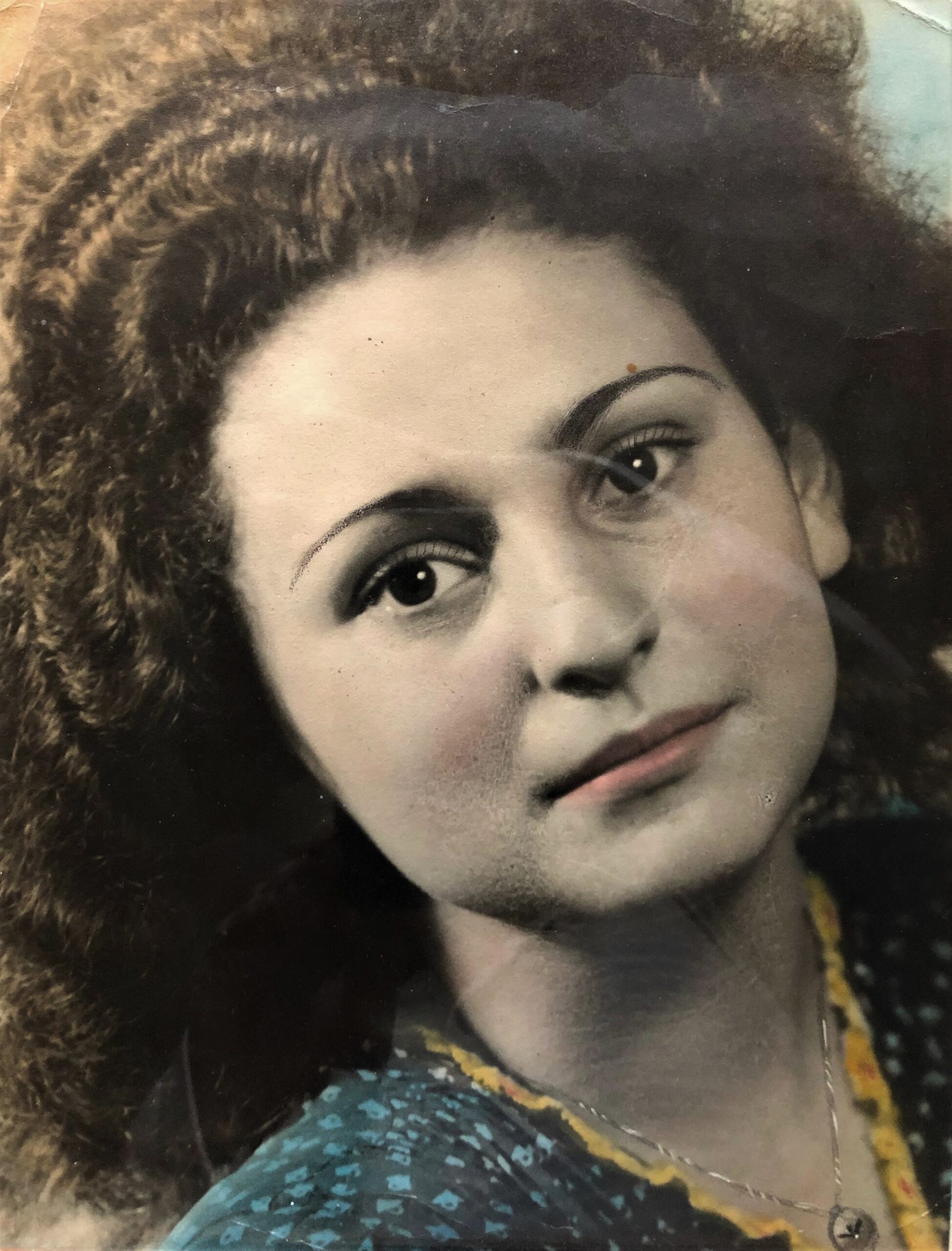 Woman with curly hair and fair skin