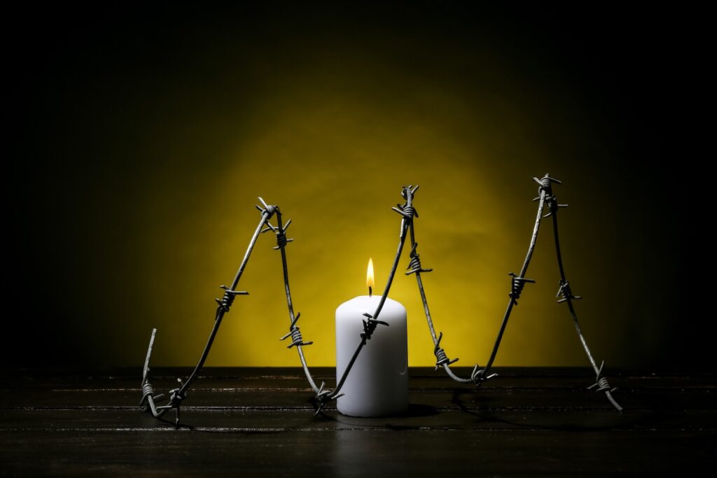 Barbed Wire with candle burning